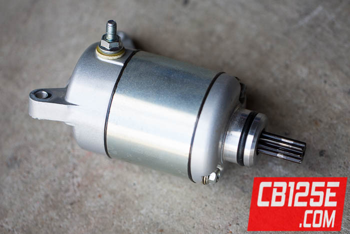 Here's a photo of the starter motor for a Honda CB125E or GLH125SH motorcycle.