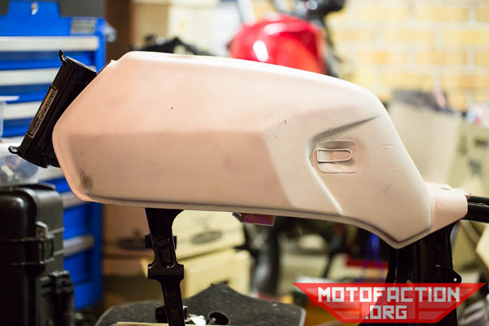 Does a Honda CX500 standard tank fit on the triple backbone frame of the CX650E, CX500E, GL500 and GL650? Here are some photos demonstrating the fit.