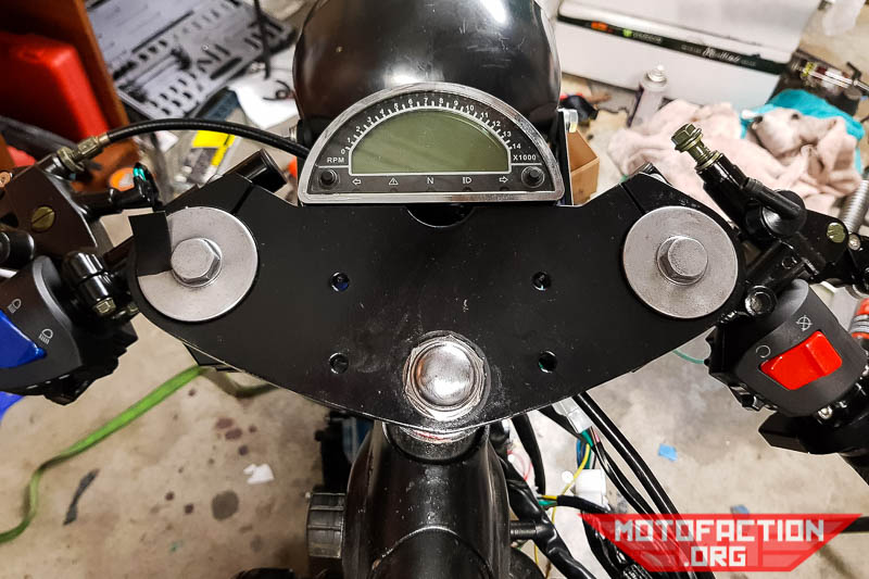Here's a photo of the top of the Hyosung GT250R upper triple clamp, discussed in relation to a Honda CX500, GL500, CX650 or GL650 front end swap or conversion to upside down forks.