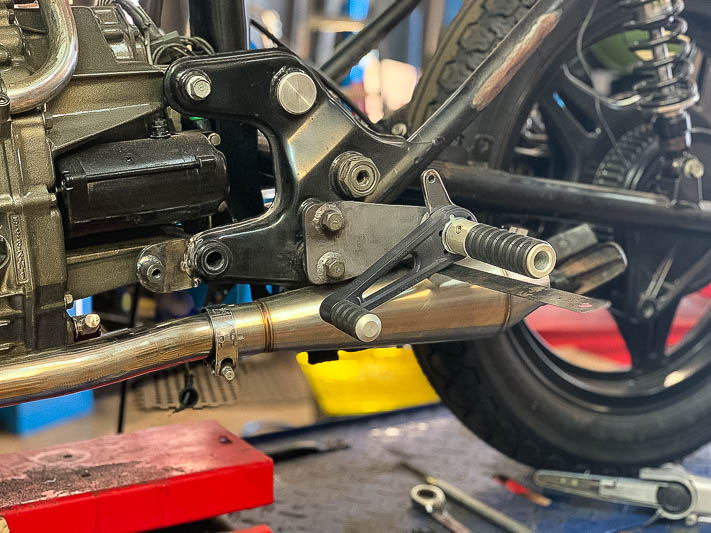 Here's how to install rear sets or move the foot pegs rearward on a Honda CX500 or GL500 Wing cafe racer build.